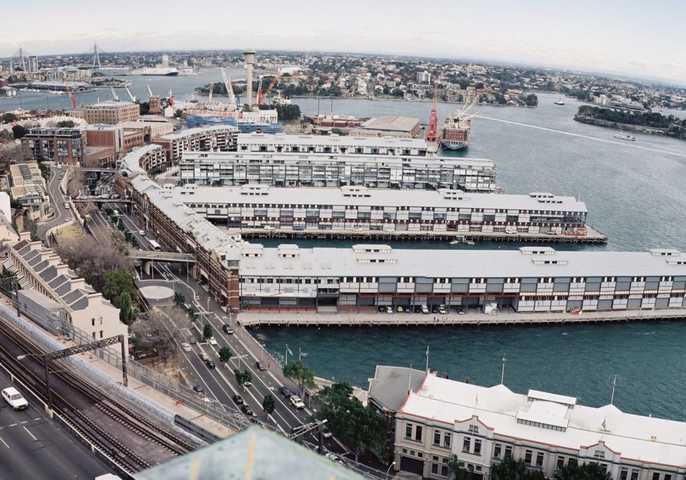 Aerial view of the Piers 8&9 finger wharves during the refurbishment, cranes working along the piers